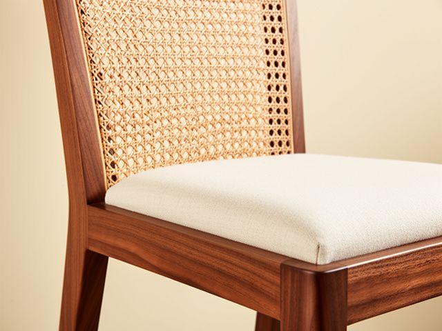 Detail of cane back on a walnut dining chair